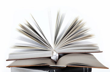 A stack of books on a white background.