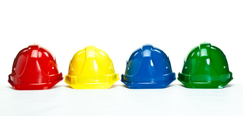 Industrial hardhats on white background