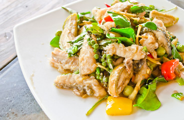 Fried fish meat with many kind of herbal