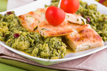 Zucchini focaccia with broccoli.