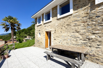 holiday home in the mountains, outdoor view, stone facade