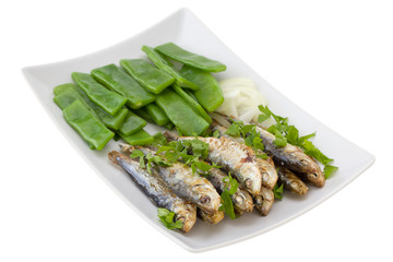 fried sardines with boiled green beans and onion
