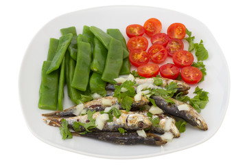 fried sardines with boiled green beans and tomato