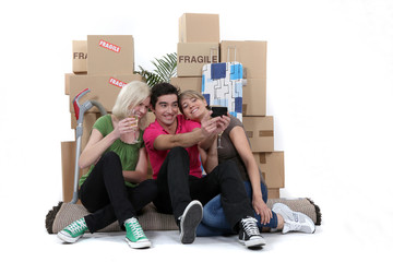 Friends marking their first day as flatmates