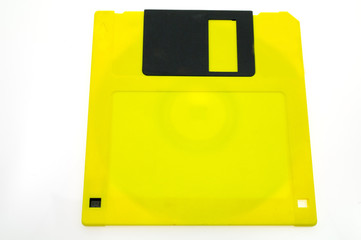 Yellow a diskette on a white background