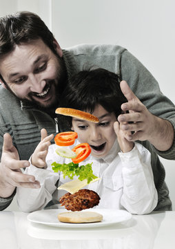 Retro Photo Of Dad And Son Making Hamburger