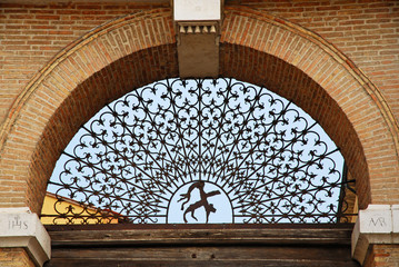 Ravenna, old medieval city door Sisi antique wrought iron gate