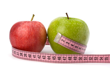Apple with tape measure. Healthy lifestyle concept.