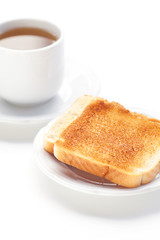 Fototapeta na wymiar tea and toast isolated on white