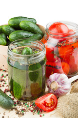 canned tomatoes and cucumbers, homemade preserved vegetables