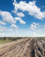 Landscape, country road with mud and beautiful sky