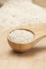 Healthy Dry Brown Rice in a spoon