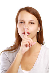 Naklejka premium Beautiful woman making silence sign