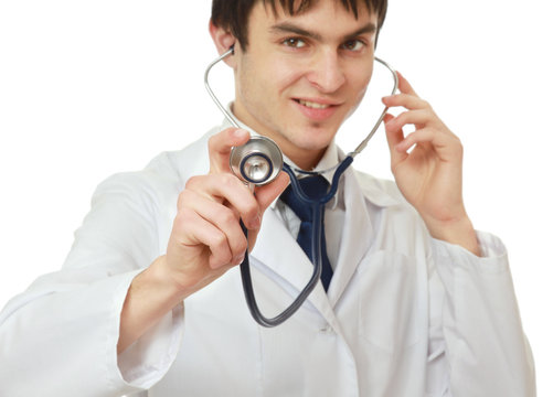Portrait of a doctor using his stethoscope.