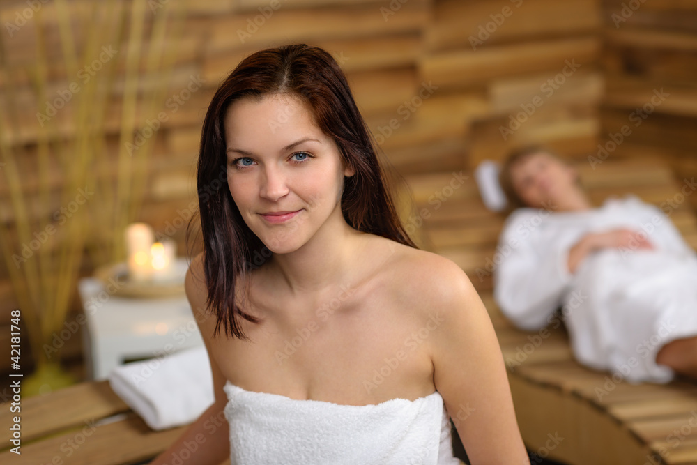 Wall mural Woman at spa room wrapped in towel