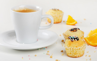 Coffee cup and muffins