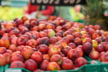 Naklejka na ściany i meble Variety of nectarines in boxes in supermarket