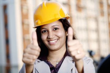 Successful Industrial engineer showing thumbs up