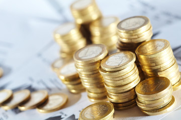 Business diagram on financial report with coins