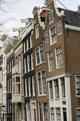 Fototapeta na wymiar leaning old facades, amsterdam