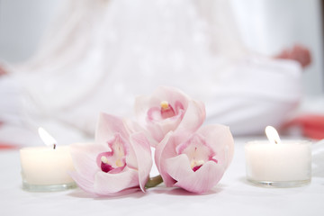 Fototapeta na wymiar orchids, candles and yoga
