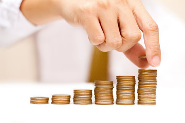 a man with rising coins