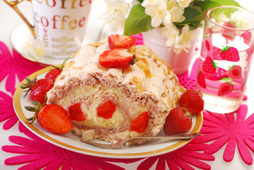 meringue swiss roll with strawberry and almonds