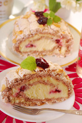 meringue swiss roll with cherry and almonds