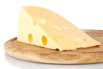 Сheese on wooden board isolated on white