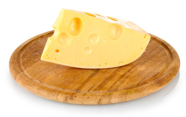 Сheese on wooden board isolated on white