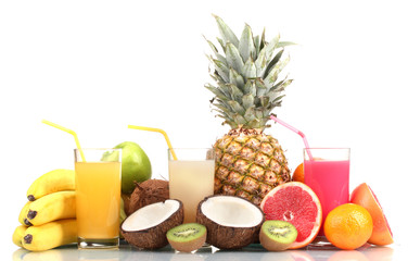 Tropical fruits and juice isolated on white