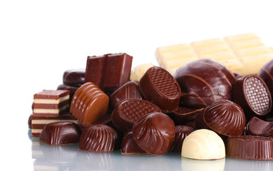 Many different chocolate candy isolated on white