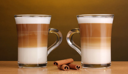 Fragrant сoffee latte in glass cups and cinnamon