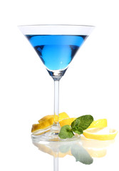 Blue cocktail in martini glass isolated on white