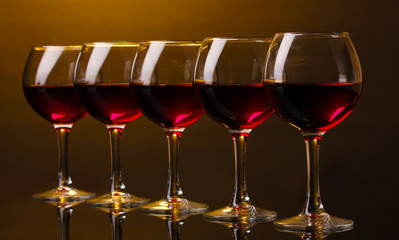Wineglasses on brown background