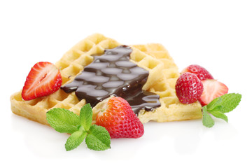 belgium waffles with strawberries and mint  isolated on white