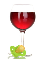 Baby dummy with alcoholic beverage isolated on white