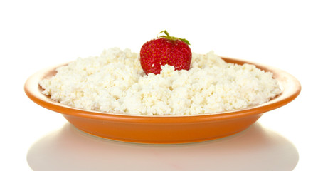 Cottage cheese with strawberry in a plate isolated on white