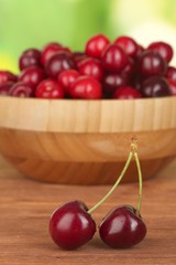 cherry in wooden bowl