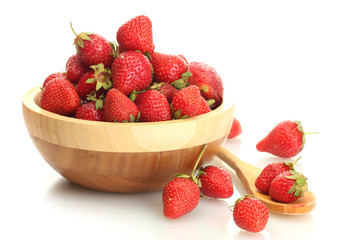 sweet ripe strawberries in wooden bowl isolated on white