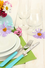 beautiful holiday table setting with flowers
