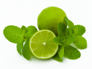 limes and mint isolated on a white background