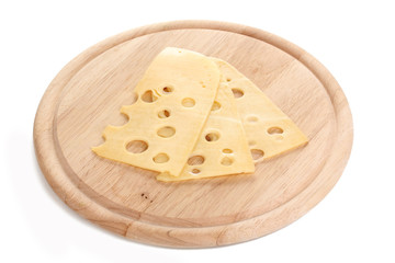 Cheese on cutting board isolated on white