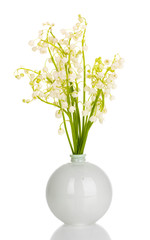May-lilies in vase isolated on white