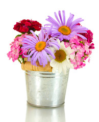 beautiful bouquet of bright wildflowers in bucket,