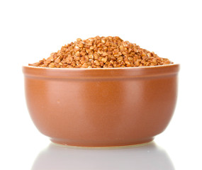 Raw buckwheat isolated on white