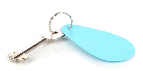 Key with charm isolated on white