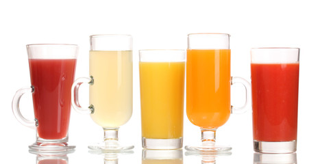 Tropical juices in glasses isolated on white