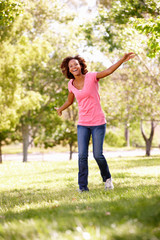 Young  woman running in park