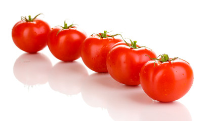 Fresh tomatoes isolated on white